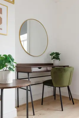 a mirror above a table and a chair at Flatzy - City Centre Mansion 2, Sleeps 22, 4 Baths in Liverpool