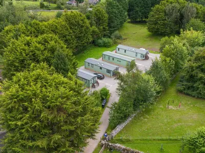 an overhead view of two trailers in a park at Lodge 4 in Carnforth
