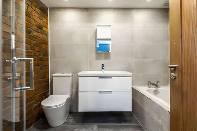 a bathroom with a toilet and a sink and a tub at Bands Warehouse I in Liverpool