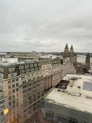 an aerial view of a city with tall buildings at Two Bedroom City View Apartment Liverpool by StaySavvy Accommodation in Liverpool