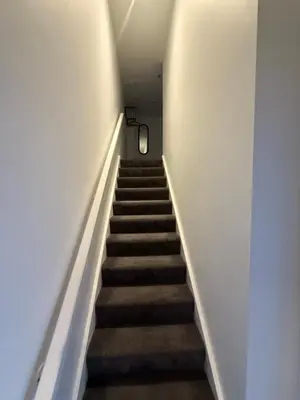 a staircase in a building with a stair case at 5 Halifax House Apartment 7 in Liverpool