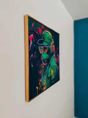 a painting of a man on a wall at Ocean Breeze in Blackpool