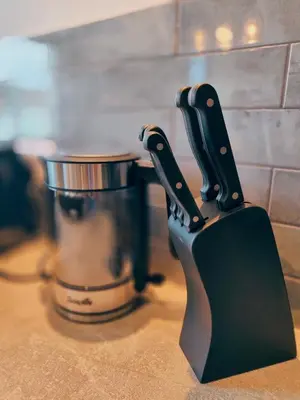 a knife block sitting on top of a counter at North View in Blackpool