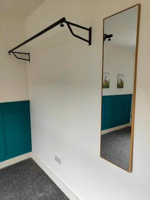 a mirror on a wall in a room at North View in Blackpool