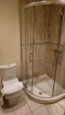 a shower stall in a bathroom with a toilet at Irwell Chambers by L3 Apartments in Liverpool