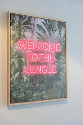 a sign that says welcome to the jungle at Richmond Terrace - Cosy and Modern Stay in Darwen