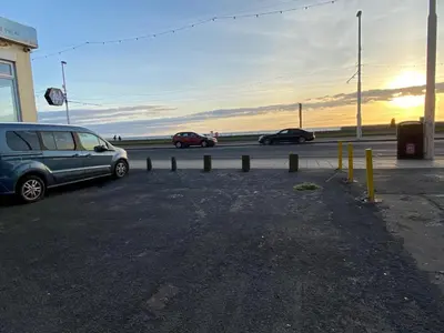 a group of cars parked in a parking lot at The Beachfront Hotel in Blackpool