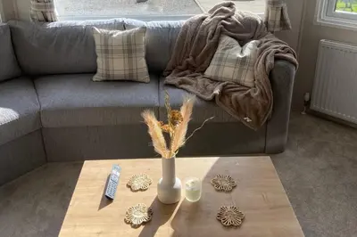 a living room with a couch and a coffee table at Westfield Lodge Retreat-Sleeps 6-Pet Friendly in Carnforth