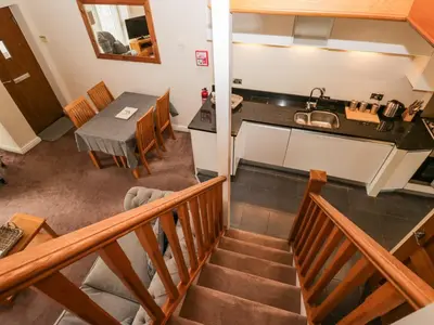 an overhead view of a kitchen and a dining room at 7 Sandpiper in Carnforth