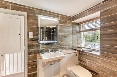 a bathroom with a sink and a toilet at 2 Bed in Field Broughton oc-l31021 in Cartmel