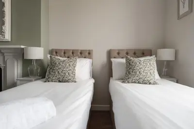 two beds sitting next to each other in a bedroom at RST Bramley Boutique in Liverpool