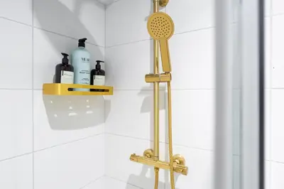 a shower with a faucet in a bathroom at RST Bramley Boutique in Liverpool