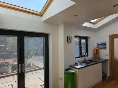 a kitchen with a sink and a window at Foundry View in Millom