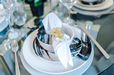 a table with a plate with a bowl with a napkin at New 2 Bed House - Perfect for Contractors & Families In St Helens Weekly & Monthly Stays in Saint Helens