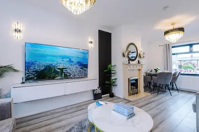 a living room with a large flat screen tv at New 2 Bed House - Perfect for Contractors & Families In St Helens Weekly & Monthly Stays in Saint Helens