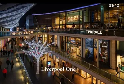 a lit up tree in a shopping mall at night at Central Apt, Parking, Walk to Shops, Bars & Trains in Liverpool