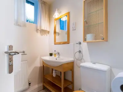a bathroom with a sink and a toilet at Wolfen Mill in Preston