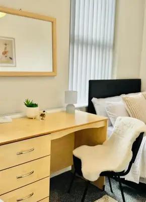 a bedroom with a desk and a bed at Room 4 Shared House in L6 in Liverpool