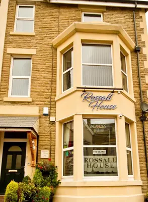 a store in front of a brick building at Rossall Guest House Blackpool - Ideal For Families & Couples in Blackpool