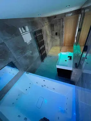 a view of a bathroom with a tub and a sink at Lux nights away in Cleveleys