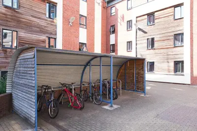 a group of bikes parked in a garage at Prospect Point in Liverpool in Liverpool