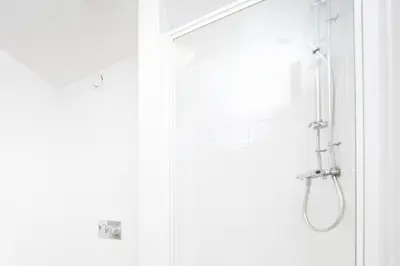 a shower in a bathroom with a glass door at Prospect Point in Liverpool in Liverpool