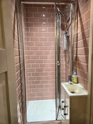 a bathroom with a shower and a sink at Beautiful Residential Within Easy Reach of Town in Haydock