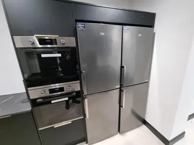 a large stainless steel refrigerator with an oven in a kitchen at 3M Luxury Living in Preston