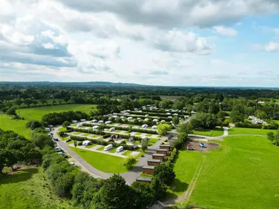 an aerial view of a large park with trees at Royal Umpire Caravan Park in Croston