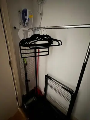 a room with a rack with a baseball bat at 2 Bedroom Apartment - Henry St Central Liverpool in Liverpool