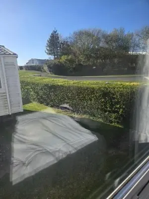 a view of a yard from a window at 12a Mill View 4 Bed Static Caravan Marton Mere in Blackpool