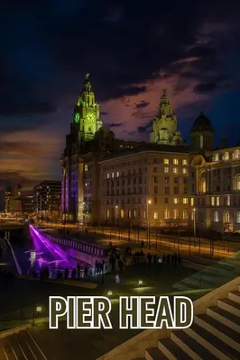 a building with a sign that reads pier head at night at Central Apt With Balcony - Walk to Bars & Stations in Liverpool