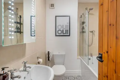 a bathroom with a sink and a toilet and a shower at 1 Bed in Weeton oc-c32015 in Great Singleton