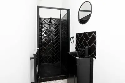 a black door with a mirror on a wall at Free Parking, 4 Bed, 2 Bath House, Long Term Stay Savings, Contractors, Near Anfield in Liverpool