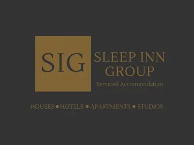a sign that reads sleep inn group with a yellow box at The Hideaway - 2-Bedroom Apartment with outdoor terrace & free parking in Lancaster
