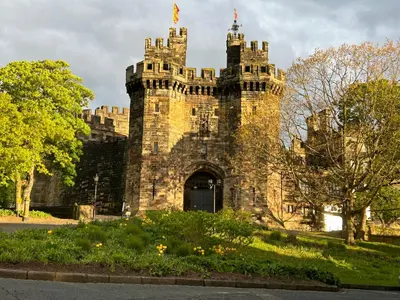 an old stone castle with a tower at The Hideaway - 2-Bedroom Apartment with outdoor terrace & free parking in Lancaster