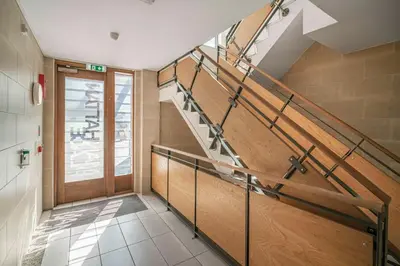 a hallway with a staircase in a building at GuestReady - Modern stay in Liverpool city centre in Liverpool