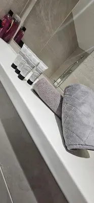 a gray tie sitting on top of a counter at 2 Bedroom Apartment with Amazing Views of Liverpool City Centre in Liverpool