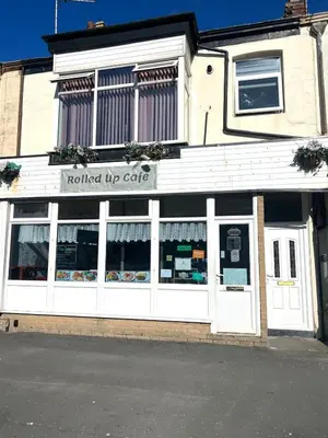 a building with aoked up care sign on the front of it at Stylish and Spacious two-bedroom Apartment in Blackpool