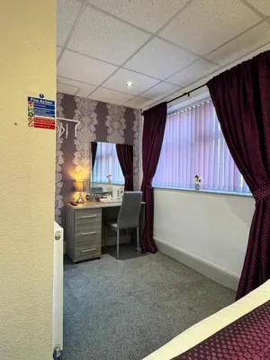 an office with a desk and a chair in a room at On The Beach Hotel in Blackpool
