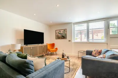 a living room with two couches and a flat screen tv at 2 Bed in West Bradford oc-c32101 in West Bradford