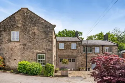 a large brick house with a garage at 1 Bed in West Bradford oc-g32100 in West Bradford