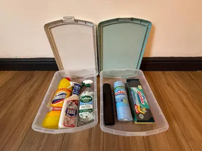 two plastic containers filled with different types of condiments at The Anfield Nook in Liverpool