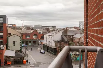 a view of a city from a building at Modern City Apartment By Chalefor Living in Liverpool