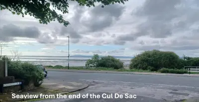 a view of the ocean from the end of the gulf de sac at Heysham Seaside Hideaway in Heysham