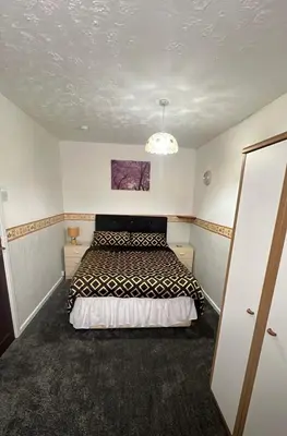 a bedroom with a bed in a room at Beachside Bliss In Blackpool 1 Bed Apartment in Blackpool