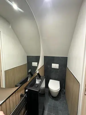 a bathroom with a toilet and a sink at 2 Bedroom Apartments Near Anfield Stadium - Sleeps 4 per Flat in Liverpool