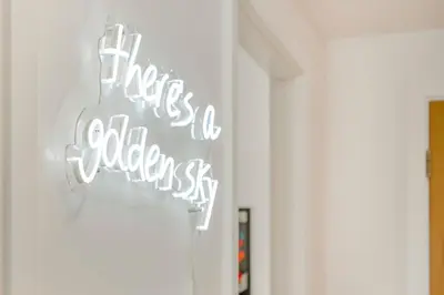 a sign that says there is a hidden sky on a wall at GuestReady - Stylish Flat with Bay View in Liverpool