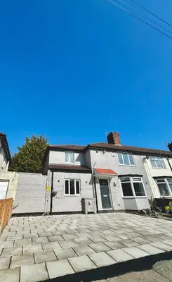a white house with a driveway in front of it at Luxury 4 Bed Home Sleeps 9, Games Room, Parking