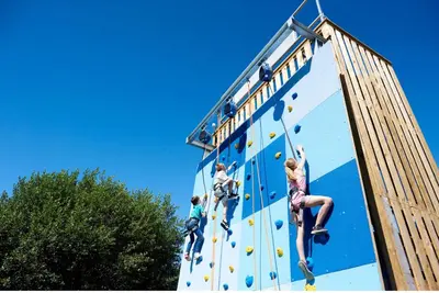 a group of people climbing on a climbing wall at Haven SAN 107 in Blackpool